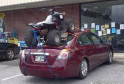 car-photo-2009-nissan-altima-atv-strapped-to-top-of-car-fail.jpg