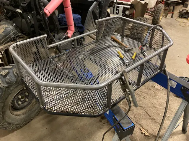 23  more welding of the mesh to the rack